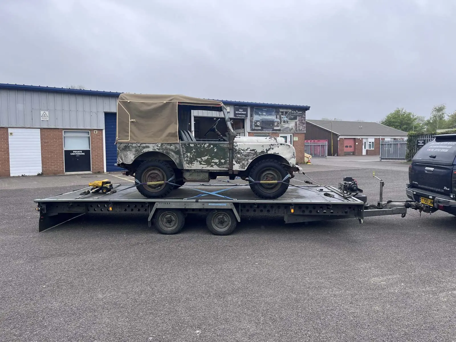 Land Rover Defender secured on a transporter Lancashire Motor Movers Lancashire